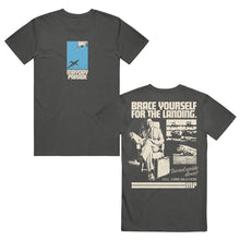 Load image into Gallery viewer, image of the front and back of a pepper colored tee shirt on a white background. front is on the left and has a center chest print of a blue rectangle with an airplane. below says mayday parade. the back is on the right and has an image of a man sitting with a suitcase and a collage of airplanes. across the shoulders says brace yourself for the landing. on the bottom right says Turned upside down? dial 1 800 m l s c r s h
