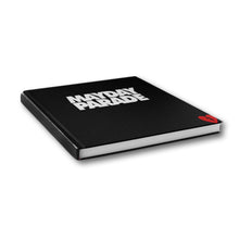 Load image into Gallery viewer, image of a black book laid on a white background. front of book says mayday parade in white and has a small, red broken heart on the bottom right corner
