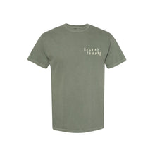 Load image into Gallery viewer, image of the front of a moss tee shirt on a white background. tee has a small chest print on the right in puff print that says mayday parade. 
