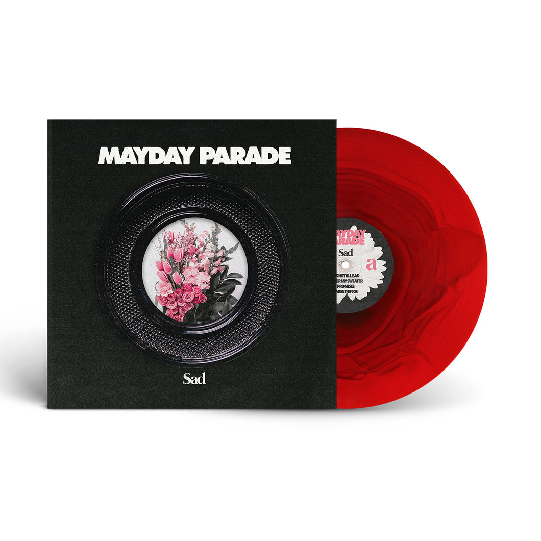A limited edition red vinyl, the Red Ripple Variant by Mayday Parade, is partially shown in its black album cover with Sad beneath and a circular frame of pink and white flowers.