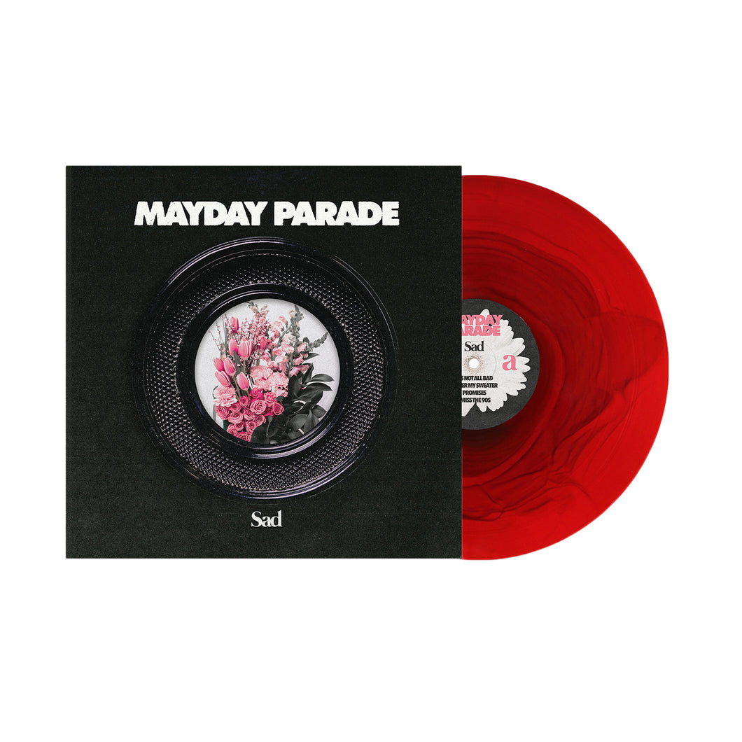 A limited Red Ripple Variant vinyl record by Mayday Parade partially slides from a black Sad album cover, showing pink flowers in a circular frame with bold white band and title text. Pre-order now to secure your copy.