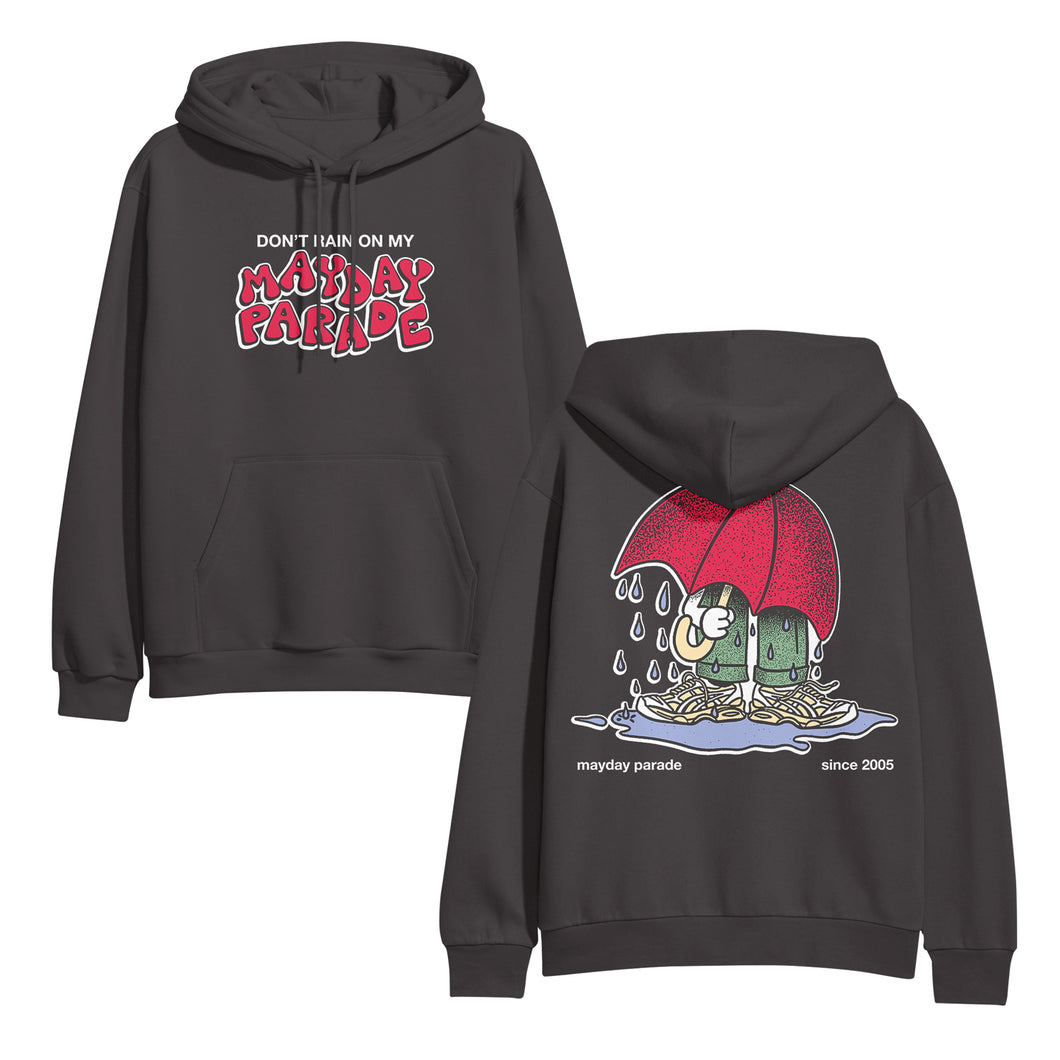 image of the front and back of a railroad grey pullover hoodie. front is on the left and has a center chest print that says don't rain on my mayday parade. back is on the right and has a full print of someone with a large red umbrella standing in a rain puddle
