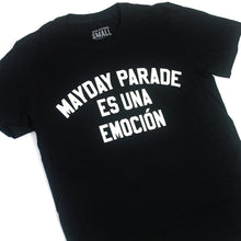 Load image into Gallery viewer, close up image of a black tee shirt on a white background. tee has white print on the center chest that says mayday parade es una emocion

