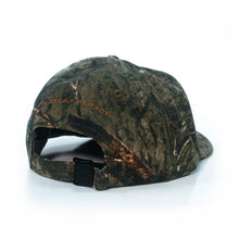 Load image into Gallery viewer, A camouflage baseball cap from Mayday Parade, shown from the back with MAYDAY PARADE embroidered in gold above an adjustable strap and black buckle, set against a white background.
