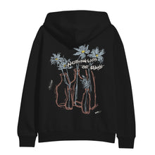 Load image into Gallery viewer, This black Mayday Parade Gildan Heavy Blend hoodie showcases a print of three blue flowers in vases with &quot;NOTHING LASTS OR STAYS&quot; distressed in white text across the center.
