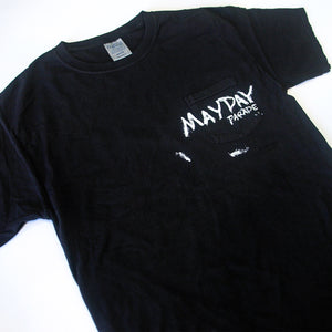 A black Mayday Parade ComfortWash Pocket T-Shirt with a front pocket and white distressed "MAYDAY PARADE" text, displayed flat on a white background.