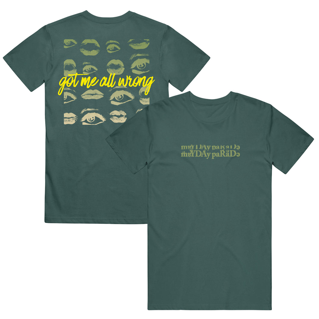 image of the front and back of a blue spruce colored tee shirt on a white background. front is on the right and has green text across the chest that says mayday parade. the back is on the left and has a back print of eyes and lips and in yellow cursive text says got me all wrong