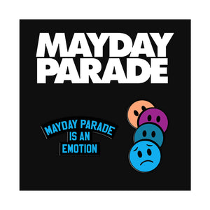 image of a black square backing with two enamel pins on it. left pin in blue says mayday parade is an emotion. third pin on right is four faces stacked to show a sad face. pins are on a black card board backing that says in white at the top, mayday parade