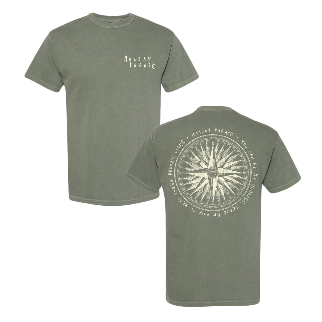 image of the front and back of a moss tee shirt on a white background. front of the the tee is on the left and has a small chest print on the right in puff print that says mayday parade. the back of the tee shirt is on the right and has a full back print of a compass