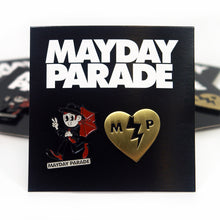 Load image into Gallery viewer, image of a black sqaure holding two enamel pins. left pin is of a man holding and umbrella, whistling and giving a peace sign with his fingers. below the man says mayday parade. right pin is of a yellow broken heart and has the letters M P in it. pins are on a black card board backing that says in white at the top mayday parade
