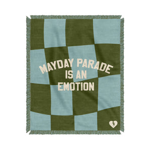 image of a custom woven blanket on a white background. blanket is green and blue checkerboard and says mayday parade is an emotion in the center.