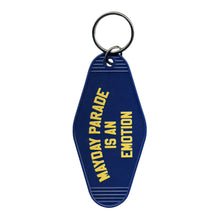 Load image into Gallery viewer, image of a blue, plastic rhombus shaped key ring. in yellow text on top of the keyring says mayday parade is an emotion
